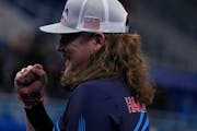 Matt Hamilton pumped his fist during the United States men’s curling match against the Russian Olympic Committee on Wednesday.