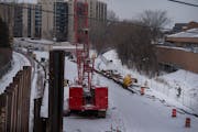 Construction of the Southwest light-rail line is seen in the Kenilworth Corridor in Minneapolis.