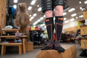 Jenner Rauscher of Joe’s Sporting Goods wore a pair of Hotronic heated socks.