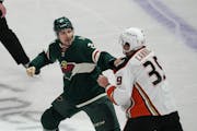 Brandon Duhaime of the Wild and Anaheim’s Sam Carrick dropped the gloves during a game on Jan. 14 at Xcel Energy Center.