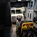 Emergency inventory technician Maria Kuehn pulled out a gurney as she prepared an ambulance for a shift on Friday at the Allina Health EMS South Metro