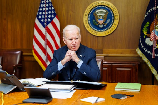 Biden warns Russia of costs of Ukraine invasion