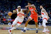Raptors forward Pascal Siakam, who is averaging 22 points per game, dribbled past Herbert Jones of the Pelicans on Monday in New Orleans.