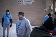 Jamil Jackson leads a team of “violence interrupters” to monitor areas around North Community High School each afternoon around dismissal time. Th
