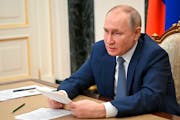 Russian President Vladimir Putin speaks during a meeting with Russian Emergency Ministry staff via videoconference in Moscow, Russia, Wednesday, Feb. 