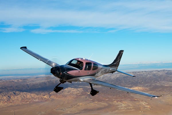 A Cirrus 2022 SR Series plane in flight. The Duluth-based aircraft manufacturer intends to expand its Duluth operations.