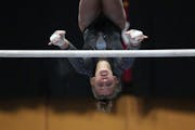Taylar Schaefer needed to be as good upside-down as right side up Saturday, and she was, winning the Class 2A all-around gymnastics title.