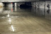 Flooding in the Calhoun Isles parking garage near Southwest light-rail construction.