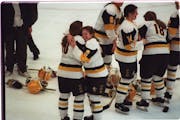 Apple Valley’s Michelle Sikich (10) and Shannon Hilligan (3) celebrated the first girls’ hockey state championship in 1995.