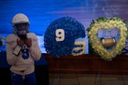 Flower arrangements next to the casket at the memorial service for Deshaun Hill Jr., 15, Tuesday afternoon, February 22, 2022 at the Frank J. Lindquis