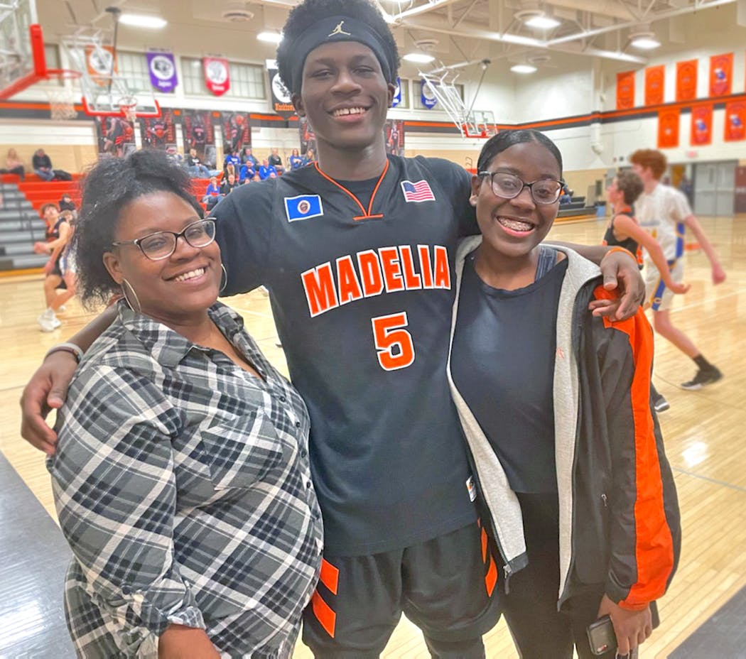 Ja’Sean Glover with his mom, Jacquisha Johnson, and sister, Ollieah Glover.
