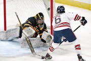 Orono’s Lyla Ryskamp shot the puck past Mankato East goalie Annaliese Rader for Orono’s 5th goal of the game during 2nd quarter action Wednesday, 