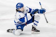 Grace Sadura (7) of Minnetonka celebrates after scoring a goal in the first period Thursday, February 24, at Xcel Energy Center in St. Paul, Minn. Cla