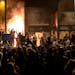 The Minneapolis Third Police Precinct building was set on fire on May 28, 2020, during a third night of protests and rioting following the police murd