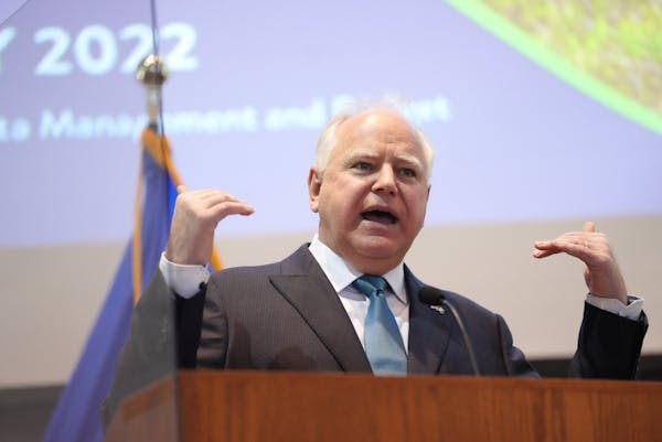 Gov. Tim Walz spoke about the new budget forecast Monday at the Minnesota Department of Revenue building in St. Paul.