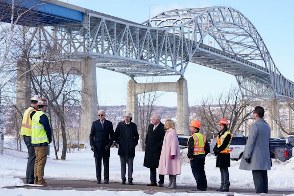 President Joe Biden and first lady Jill Biden visit the John A. Blatnik Memorial Bridge that connects Duluth, Minn., to Superior, Wis., Wednesday. Sta