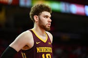 Gophers forward Jamison Battle led all scorers in a 75-62 loss at Northwestern with 20 points.
