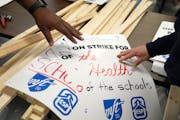 Members of the Minneapolis Federation of Teachers and Education Support Professionals created picket signs ahead of a strike that lasted nearly three 