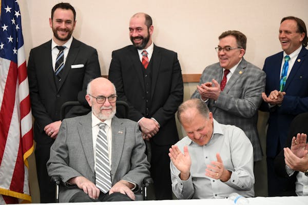Family, politicians and ALS advocates applauded DFL state Sen. David Tomassoni during a news conference earlier this month highlighting proposals to e