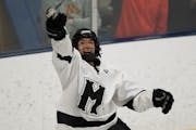 Minneapolis defenseman Leo Warner celebrated when his team won its section and secured a spot in the Class 1A boys’ hockey tournament.