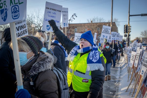 Kelly Metzler, a teacher at Wilder, joined around 200 Minneapolis teachers and supporters as they take to the sidewalk to picket at 34th Street and S.