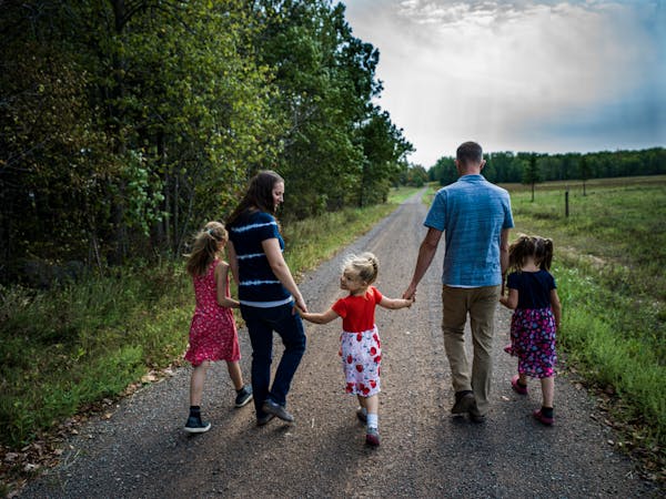Renee and Andy Crisman with their three daughters. The bitter dispute over maintenance of the road to their property started in 2017, after the Crisma