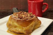 Hell’s Cafeteria is opening upstairs from the 20-year-old Hell’s Kitchen in downtown Minneapolis. Its beloved caramel-pecan rolls will be on the m