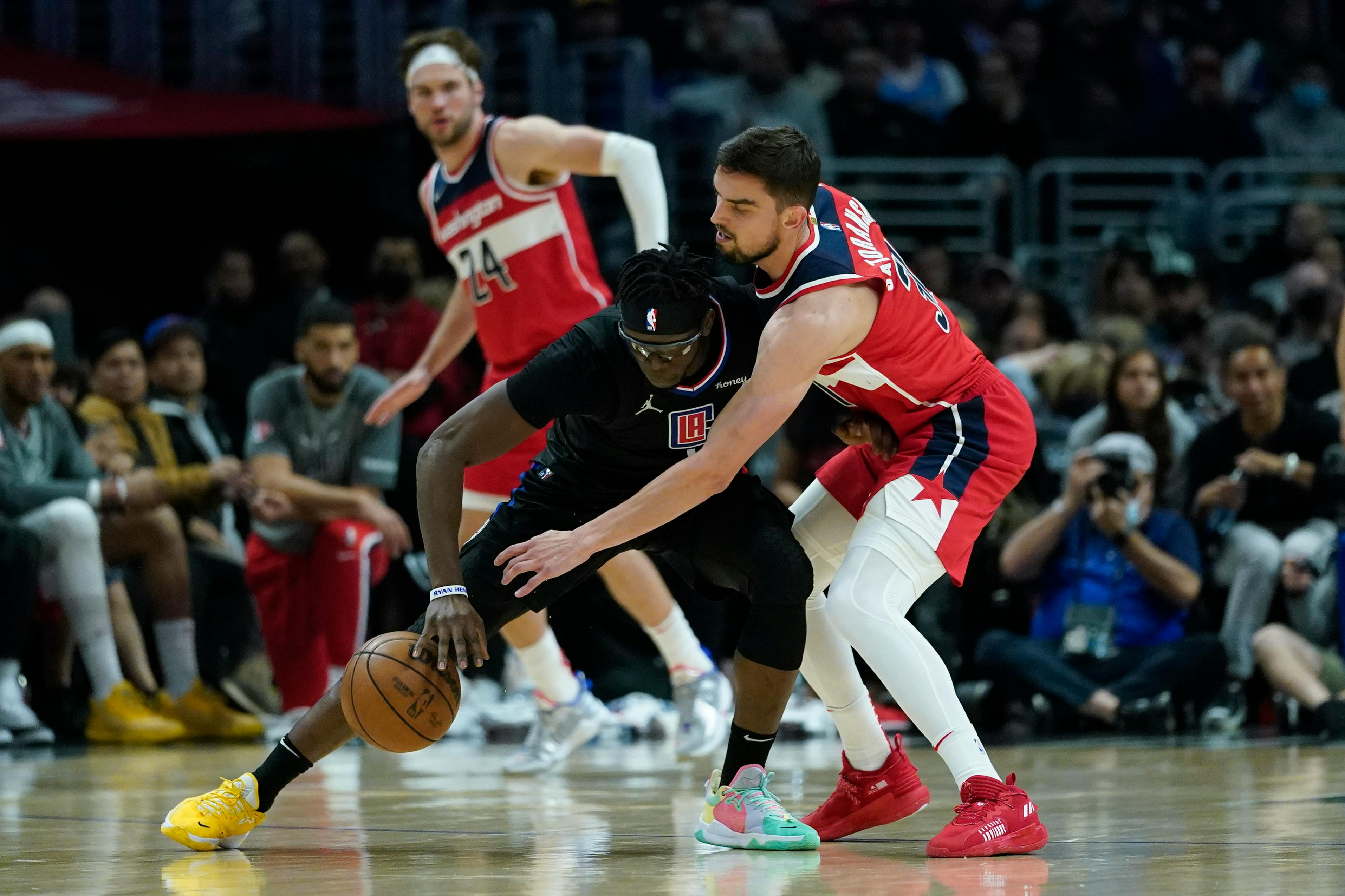 https://www.startribune.com/clippers-rally-past-wizards-again-for-115-109-victory/600154628/