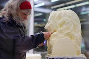 Artist Linda Christensen carved Laura Grimm’s bust out of a solid block of butter in the Dairy Building at the 2018 Minnesota State Fair. ] ANTHONY 