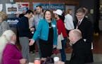Sen. Michelle Benson arrived early at a GOP convention for Senate District 57 at Lakeville North High School to mingle with party activists.