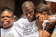 From left, Cheryl Frazier, sister of Leneal Frazier; Orlando Frazier, Leneal’s brother; and Jamie Bradford, 20, Leneal’s daughter, during a news c