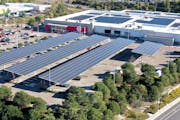 A Target store in Vista, Calif., features thousands of solar panels on its roof and on carports in the parking lot.