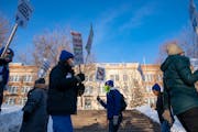 Dozens of educators on strike picketed outside Justice Page Middle School in Minneapolis, on Tuesday, March 8, 2022. 