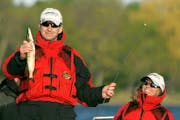 Gov. Tim Pawlenty found humor in his first catch during 2009’s Governor’s Fishing Opener on White Bear Lake. His wife, Mary, was in on the laugh.