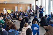Members of the Minneapolis Public Schools negotiation team answered questions as more than 100 high school students held a sit-in at district headquar