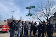 Minneapolis residents, firefighters and descendants of John Cheatham cheered as Cheatham Avenue replaces Dight Avenue. The street, once named after th