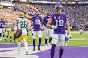 Vikings wide receiver Adam Thielen (19) celebrates a touchdown against the Packers on Nov. 21.