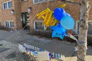A memorial for Tanasha Austin was created at the scene of the shooting in the Lowry Hill neighborhood of Minneapolis. Family and friends gathered Satu