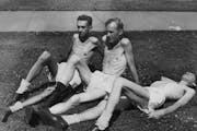 Volunteers Gerald Wilsnack, Marshall Sutton and Jasper Garner relaxed in the sun during their daily routine as participants in the Ansel Keys starvati