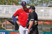 Twins manager Rocco Baldelli talked with an umpire during a game Sunday in Fort Myers, Fla.