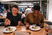 Partners Holly Freeberg and Lanoira Duhart, of Crystal, dined at Travail Kitchen and Amusements in Robbinsdale. “We’ve been watching ‘MasterChef