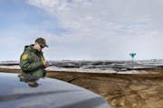 Border agent David Marcus looked for footprints in March near where two people and their trafficker were found. 