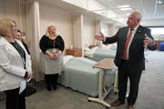 Minnesota Gov. Tim Walz toured the nursing program facilities at St. Paul College on Tuesday.