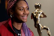 South Carolina’s Aliyah Boston posed with the trophy after being named 2022 Naismith Women’s College Player of the Year on Wednesday.