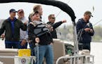Gov. Tim Walz laughed while fishing in a traditional opening day entourage during the 2019 Governor’s Fishing Opener in Albert Lea.