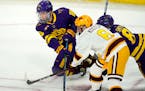 Gophers defenseman Mike Koster battled with Minnesota State’s Cade Borchardt and Nathan Smith in an NCAA regional final last year.