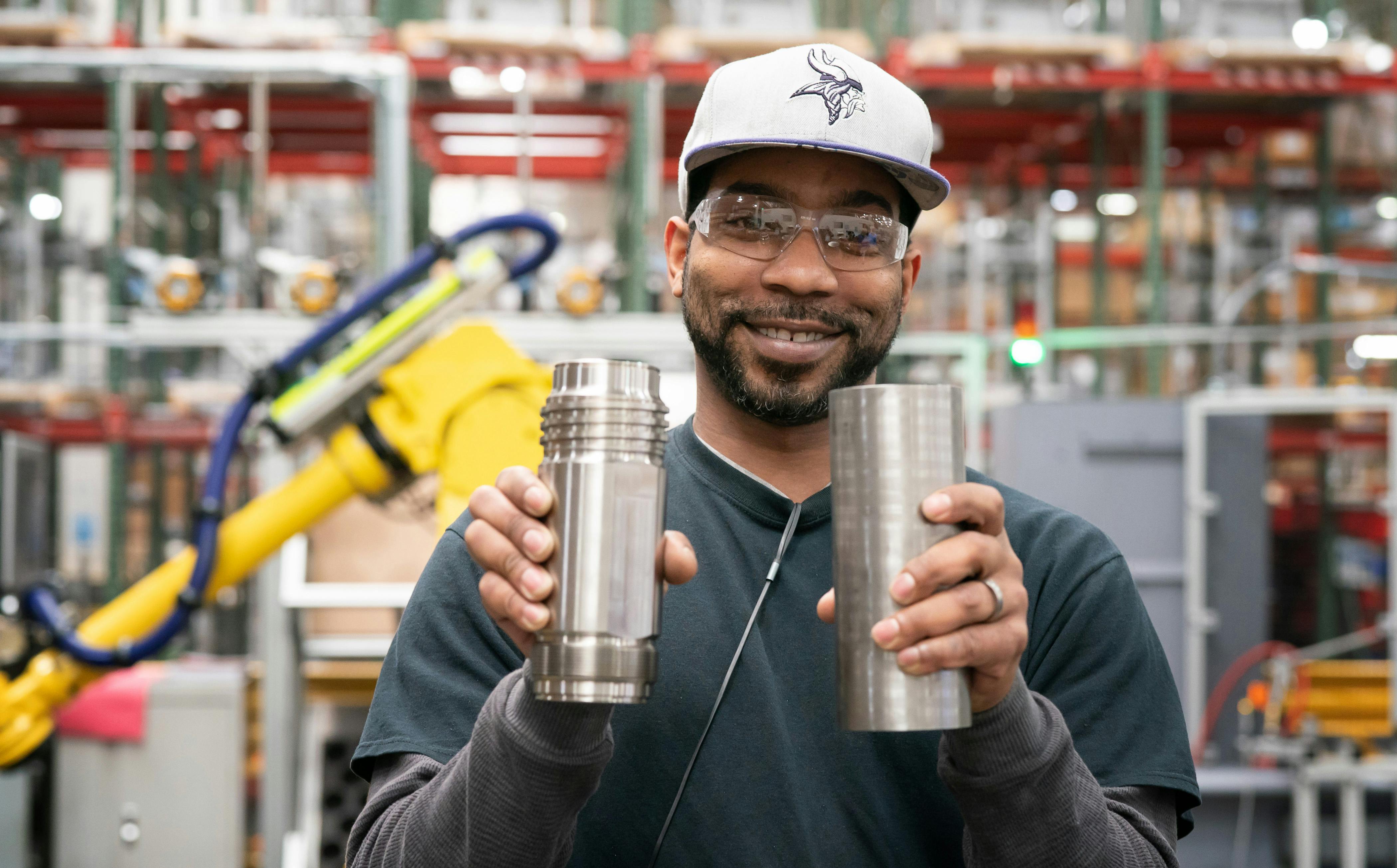 Graco CNC machinist Corry Whitaker showed how a piece of stainless steel is made into a part for an industrial power sprayer in 2019.