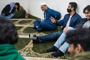 Imam Asad Zaman led a group of teenagers including youth leader Maaz Mohammad, right, in a discussion on Ramadan at Blaine Muslim Community Center on 