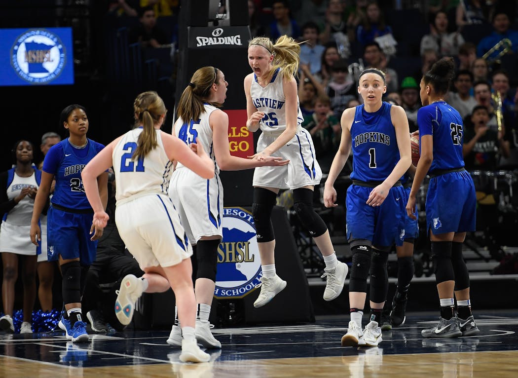 Eastview celebrated a second-half basket against Hopkins and Paige Bueckers (1) during the 2018 Class 4A title games.
