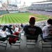 Fans in the Club level kicked back and enjoyed a perfect day for an outdoor baseball game when the Twins opened Target Field in 2010.